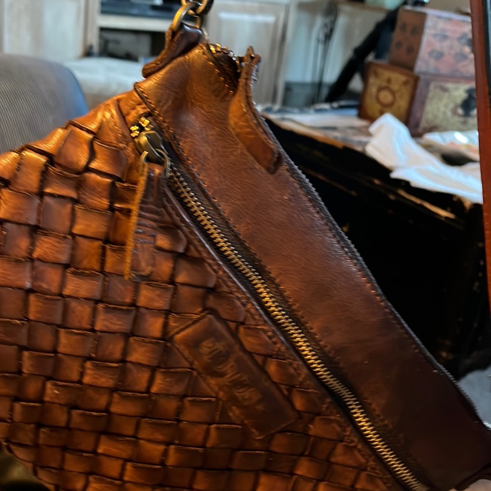 Vintage pikolinos handbag is broken in with no rips, rates or pulls.